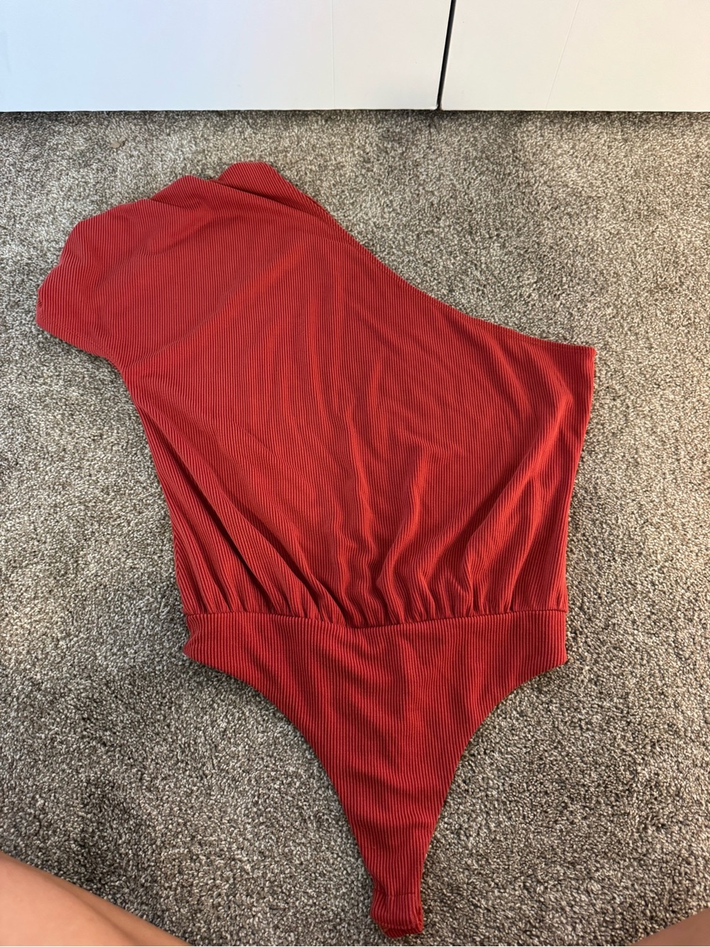 Lovers + Friends One-Piece Bodysuit in Rust Red